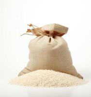 rice in burlap bag isolated on white background created with technology photo