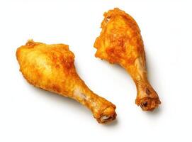 Roasted chicken leg on a white background created with technology photo