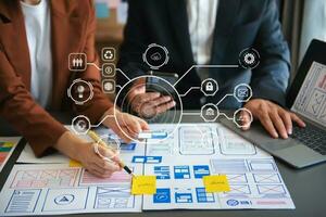 UX graphic designer planning application process development prototype wireframe for web smart phone. Creative digital development agency. photo
