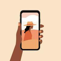 Hand holding a phone vector
