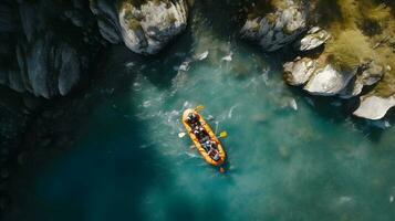 Aerial top view Extreme sport kayak sails mountain river with sun light. Rafting, whitewater kayaking. photo