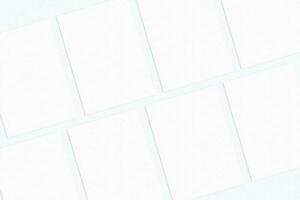 Empty lot of paper sheets on white background for making mock-up. photo