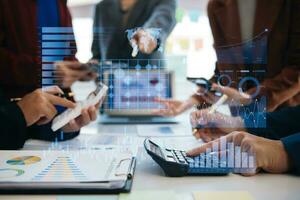 Financial report data of business operations balance sheet and income statement and diagram as Fintech concept.Business team meeting. digital tablet and computer laptop. photo