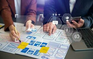 UX graphic designer planning application process development prototype wireframe for web smart phone. Creative digital development agency. photo