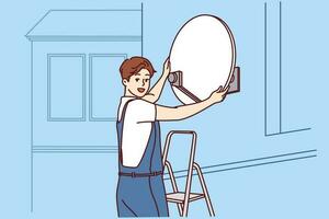 Master installs television satellite dish on facade of building standing on stepladder and looking at screen. TV company specialist sets up access to satellite TV channels for residents house vector