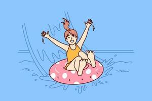 Little girl in pool floats on inflatable ring and enjoys visiting aqua park in sunny summer weather. Happy childhood of child relaxing in pool and sliding down slide in water park for kids vector