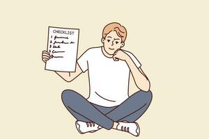 Man demonstrates checklist recommending time management and organizing own work. Smart smiling guy is sitting and holding checklist with tasks for day or step-by-step plan to achieve goal in hand vector