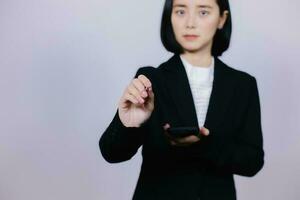 Businessman using digital smart phone with modern mobile phone. New technologies for success workflow concept. photo