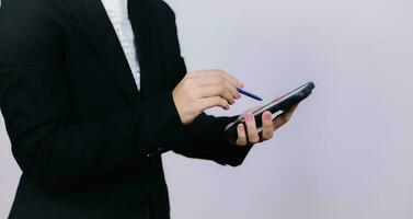 Businessman using digital smart phone with modern mobile phone. New technologies for success workflow concept. photo