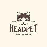 animal pets cat head smile mascot vintage logo design vector