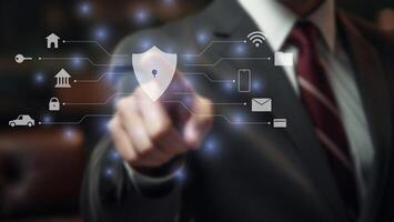 cyber security technology concept. businessman pointing to virtual screen with shield protection symbol. photo