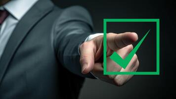 choose the right thing. business man hand point to check mark sign. vote and approved concept. photo
