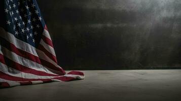 American flag on dark concrete with free space photo