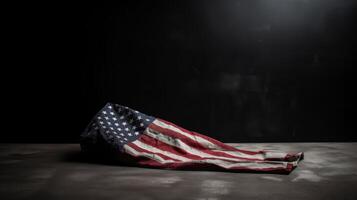 American flag on dark concrete with free space photo