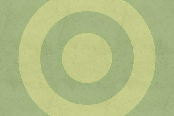 green aged target circles on textured surface