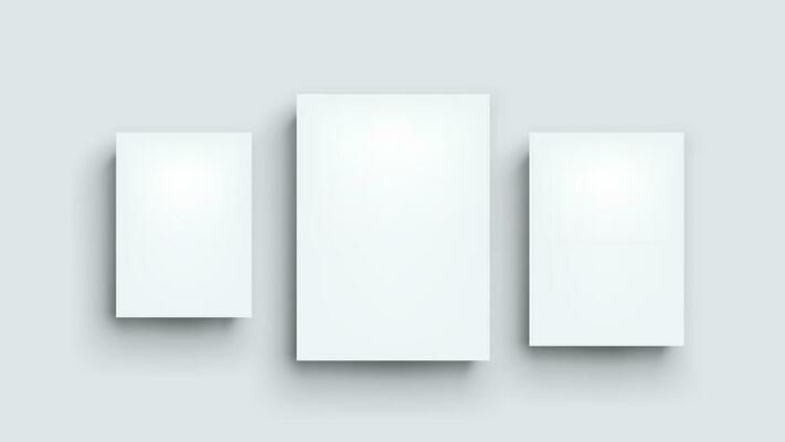 three white boards on grey