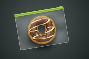 transparent plastic package with donut on dark vector