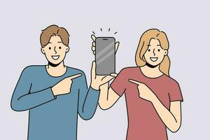 Smiling couple point at cellphone with empty screen. Happy man and woman point with finger on smartphone. Recommendation and technology. Vector illustration.