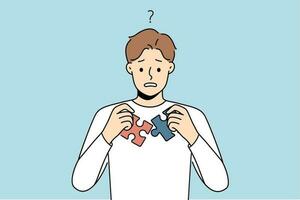 Confused man unable to join puzzle pieces. Frustrated guy brainstorm think about jigsaw connection. Problem solution and dilemma. Vector illustration.