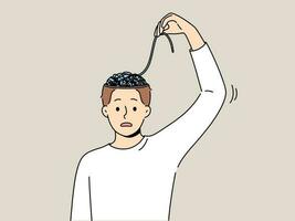 Man with mental problems associated with confusion needs help of psychologist to improve mental health. Young guy is confused trying to unravel threads in brain and looks into camera vector