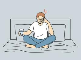 Unhealthy man sit on bed suffer from migraine holding glass of water with pill. Unwell guy struggle with headache from hangover take painkiller medication. Vector illustration.