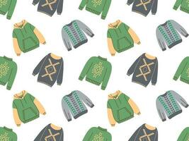 Seamless pattern of sweaters or jumpers isolated on white background. Collection of seasonal warm clothing with prints. Colorful vector illustration in flat cartoon style.