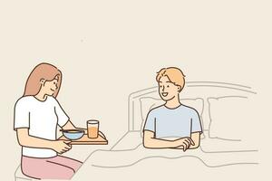 Caring wife brings breakfast to bed to beloved husband, wanting to bring joy or caring during illness. Young cheerful family couple spend time together on weekend and have breakfast in bedroom vector