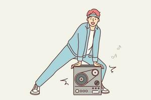 Man stands near retro tape recorder for playing music from tape and invites to party in style of 90s. Guy in tracksuit uses musical retro equipment to organize disco or dance festival vector