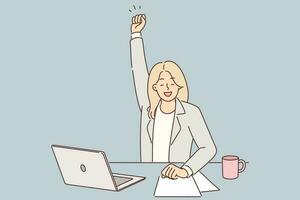 Successful woman manager celebrates victory and raises hand up sitting at table with laptop. Businesswoman rejoices at successful completion of project enjoying new achievement or signing contract vector