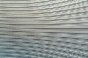 Texture of metal sheet roof. Curved metal roofing panels view from below photo