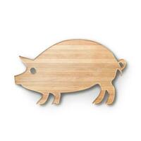 Close up view wooden cutting board with pig shape fit for kitchen concept. photo