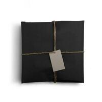 Classical black paper bag isolated on white background fit for your mockup design. photo