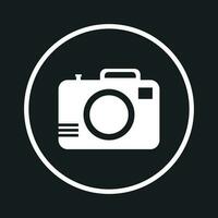 Camera icon on black background. Flat vector illustration.