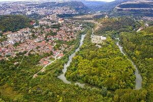 Aerial view from drone of the big curve of the river near city, Yantra and Veliko Tarnovo, Bulgaria photo