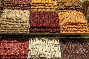 Many different sweets in the market. Horizontal view photo