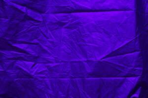 Wrinkled plastic wrap texture for background. rough gradient foil pattern photo