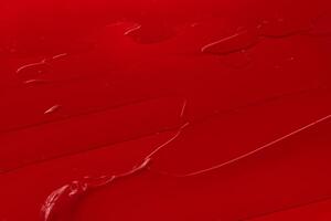 Abstract red acrylic paint texture background photo