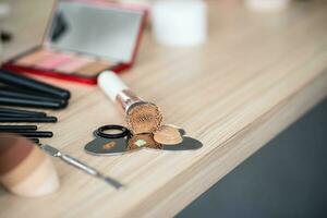 Decorative cosmetics makeup set on wood table. Set of luxury makeup product background photo