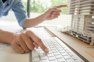 Architecture drawing on architectural project business architecture building construction Colleagues interior designer Corporate. Planning Design on blueprint Teamwork with compasses. photo