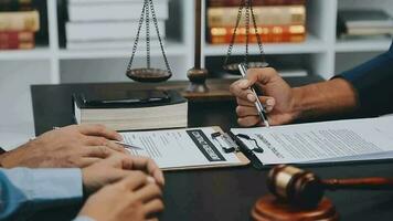 Customer service good cooperation, Consultation between a Businessman and Male lawyer or judge consult having team meeting with client, Law and Legal services concept. video