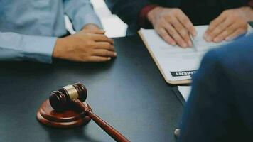 Customer service good cooperation, Consultation between a Businessman and Male lawyer or judge consult having team meeting with client, Law and Legal services concept. video