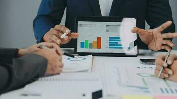 Close up of Business team analyzing income charts and graphs with modern laptop computer. Business analysis and strategy concept. video