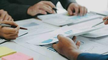 Close up of Business team analyzing income charts and graphs with modern laptop computer. Business analysis and strategy concept. video