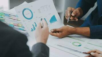 Close up of Business team analyzing income charts and graphs with modern laptop computer. Business analysis and strategy concept. video