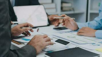 Close up of Business team analyzing income charts and graphs with modern laptop computer. Business analysis and strategy concept. video