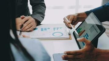 Close up of Business team analyzing income charts and graphs with modern laptop computer. Business analysis and strategy concept. video
