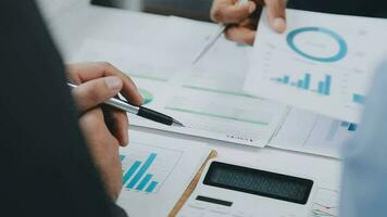 Close up of Business team analyzing income charts and graphs with modern laptop computer. Business analysis and strategy concept. video