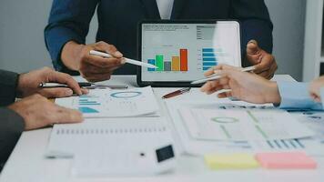Close up of Business team analyzing income charts and graphs with modern laptop computer. Business analysis and strategy concept. video