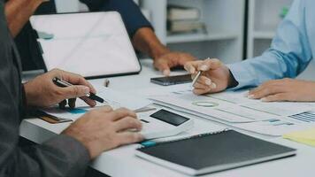 Close up of Business team analyzing income charts and graphs with modern laptop computer. Business analysis and strategy concept. video