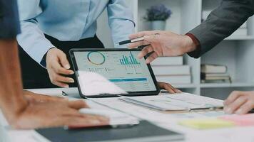 Close up of Business team analyzing income charts and graphs with modern laptop computer. Business analysis and strategy concept. video